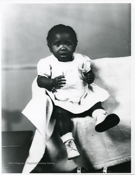 Portrait of a African-American baby girl.