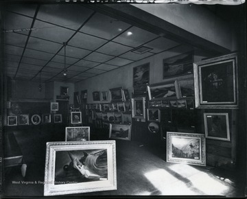 Paintings by George Blaney fill this room during an Art Show in the 1930s.