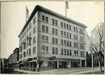 Image from 'Industrial and Picturesque Clarksburg, W. Va.' published by the Press of the Clarksburg Telegram Company, Printers and Publishers, Clarksburg, W. Va., 1911. Building erected 1910, Gore Apartments in Rear.