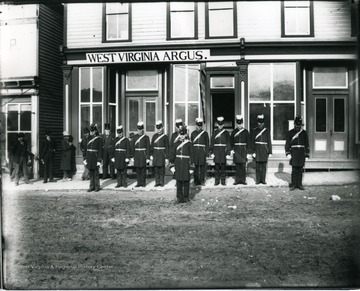 Soldiers standing in front of West Virginia Argus Building in Grafton, West Virginia.