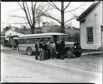 Boys loading into a Taylor county school bus, Grafton, W. Va.