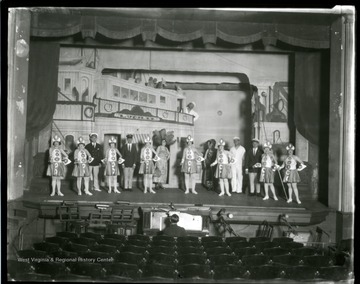 Members of the LaSalle Musical Comedy Troupe on stage.