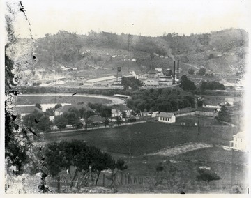 View of homes, fairground, and factory buildings thought to be in West Virginia