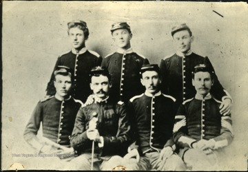 'Back row: C. R. Wilson, E. E. Duddey, Ed Sanford, Tickenagh. Front Row: Lou Chapman, J. E. Verlandenr Otto Newton, C. J. Southworth.'