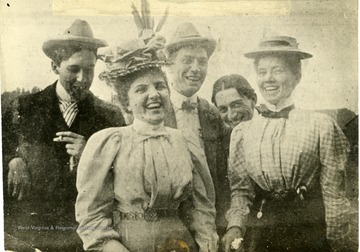 Men and women laughing. Left to right: Dr. Earl Schaefer, Garnet Wilson(now Mincey), H. O. Aleshire, Page Aleshire, Lyde Thackston (now Blair).'