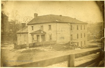 'Old Stone Jail, erected about 1800. Added to and Remodeled. Photographed Dec. 19th 1883 by Lindsey and Son (Slight snow on the ground.)