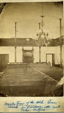 'Inside view of the Old Stone Church in Lewisburg with small pipe organs.'