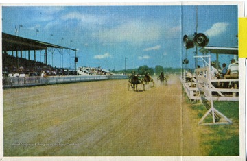 'Trotters finish fast before a large crowd at the West Virginia State Fair at Lewisburg, Greenbrier County.'