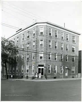 Two nurses (women) walking out of the city hospital, Martinsburg, W. Va.