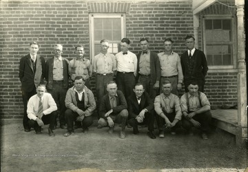 Group portrait of fourteen Standard Cement employees, Martinsburg, W. Va.