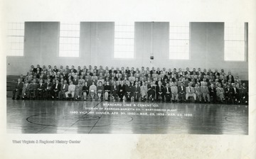 Group portrait of Standard Lime and Cement Company, Division of American Marietta Company, Martinsburg Plant workers attending the 1960 Victory Dinner on April 30, 1960.