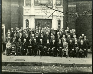 Group portrait of men outside the church.