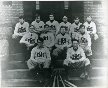 Group photo of the Rippon baseball team sitting on stairs. 