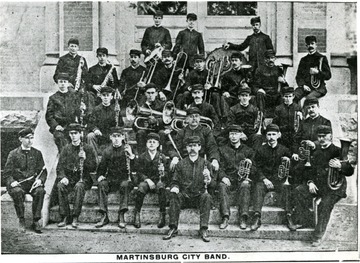 Group portrait of band members and their instruments.