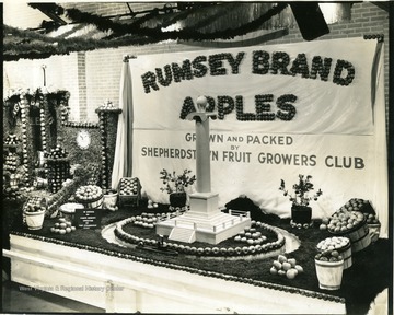 Display boasts a monument surrounded by a stream with a steamboat in front.  Display was in honor of James Rumsey, the inventor of the steamboat.