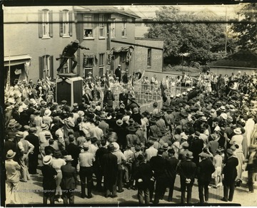 Townspeople attend the dedication of the Doughboy Statue in Martinsburg, West Virginia.