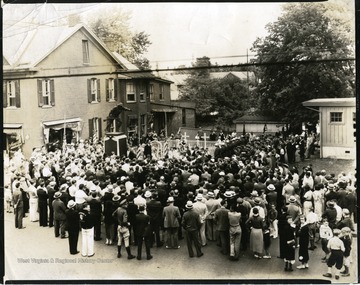 Townspeople attend the dedication of the Doughboy Statue in Martinsburg, West Virginia.