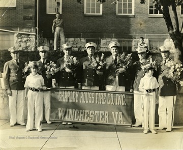 Members of the Charley Rouss Fire Company Inc., of Martinsburg, West Virginia pose for a group portrait.