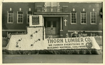 Thorn Lumber Company Float is in front of a church in Martinsburg, West Virginia.