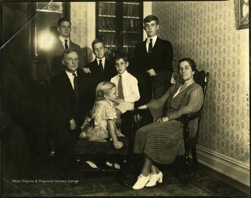 Group portrait of four boys, a girl, a woman, and a man, Martinsburg, W. Va.