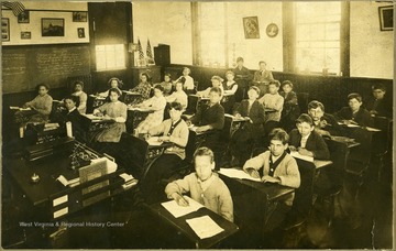 'Ruth Fridinger taking in 1910.' Students sitting at their desks in a classroom, Martinsburg, W. Va.
