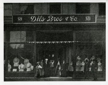 Customers are standing in front of Dils Brothers and Company in Parkersburg, West Virginia.