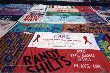 Sistersville, W. Va. panel of AIDS quilt that reads "We care, remember those from West Virginia."