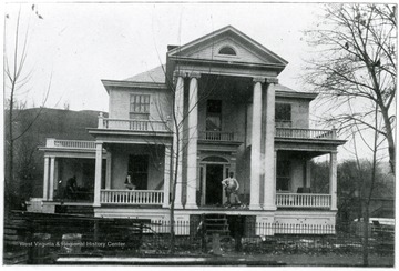 Residence of Jno. E. Mcguire in course of construction on the corner of First and Centre Streets, Weston, W. Va.