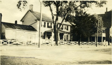'The old Judge Matthew Edmiston home place on Main Street.  At the north end, next alley stood a one story cottage, now site of Democrat office.'
