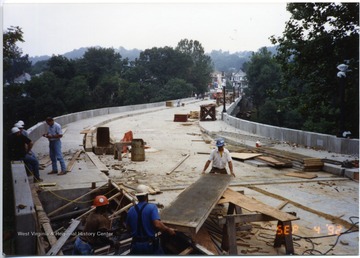 A nearly finished South Park bridge. Workers can be seen in progress.