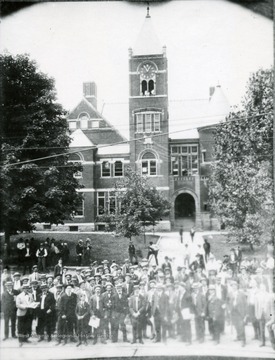 Crowd can be seen in front of the courthouse in Morgantown, W. Va. 
