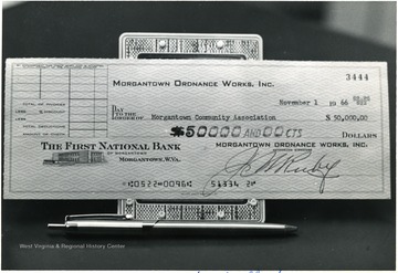 Morgantown Ordinance Works, Inc. check for 50,000 dollars made out to the Morgantown Community Association signed by J.W. Ruby, Morgantown, W. Va.
