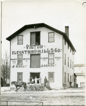 'Victor Elevator and Mills Co. North of Walnut St. on the West side of University Ave.  Built by the late E. C. Allander about 1885.' 