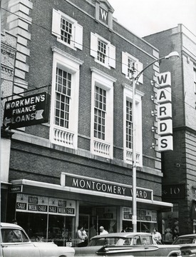 Montgomery Ward located on High Street in Morgantown, W. Va. People on side walk in front of or passing by store. 