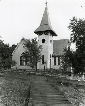 Church in Morgantown, W. Va. Perhaps 'Episcopal' in denomination. Walkway leads to fencing around Church. 