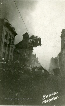 'Strand Theatre wall falling into High Street'. 