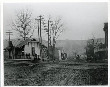 'Elm Grove Baltimore and Ohio Railroad Station 1888; in distance is the old Stone Bridge. January 25, 1853 first train came to the city of Wheeling from Baltimore.'