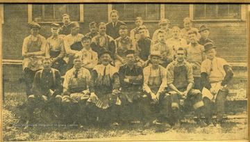 'Front Row, left to right--Ad Campbell 'Packer', William Morrison, Harry Nelson, Ernie Howard, Herbert Swindell, Roy Mayfield 'Warehouse', and Jesse P. Klinger.  Middle Row, left to right--Homer Rhor 'Box Shop', Sam Norcross, Harry Cline, Charles Andrews 'Packer', W. L. Fairfield, Harry Patrick, E. C. Robson, Fernand Lefevre, Frank Gallagher, Sr., Frank Gallagher, Jr., and Camille Rassart.  Rear Row, left to right--Leopold Lefevre, Harry Chips 'Yard Boss', Jim Kiefer, Boss Cutter, Earl Norcross, Alphonse Farley, and Henry Barriat.'