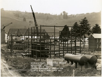 '1:00 P.M. May 15, 1941.  Looking northwest at catalyst and caustic plants from tower No. 1. Photograph Number 128.'