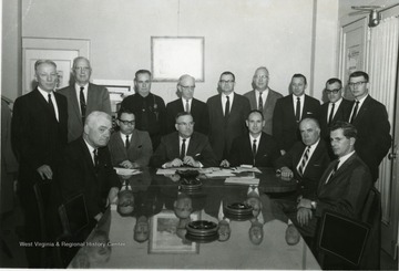 Chamber of Commerce meeting in Morgantown, West Virginia. Some of those attending are as follows: 'Bill Lgyne, Robert Smyth, Chief John Lewis, Howard Smyth, and Dyke Raese. 