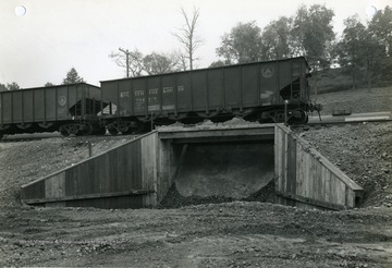 'United States Engineer Office. Corps of Engineers United States Army. Pittsburgh, Pennsylvania. Morgantown Ordnance Works-Morgantown, West Virginia: Coal Unloading Hopper-looking West. E. I. Du Pont de Nemours and Company- Contract W Ord-490- Contract date 11-28-40. Military Funds. August 17, 1943. No. 21141.'
