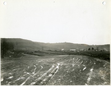 '11:00 A.M. January 1, 1941.  Looking Northwest. Coke oven area grading in foreground.  Grading for plant factory and power area in background.'