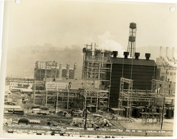 '4:00 P.M. Dec. 30, 1941.  Looking east at electrical substation and factory building.'