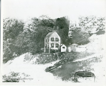'First Stiles home, looking east from the road near pump station. Torn down about 1950.'