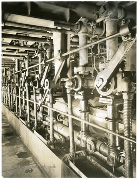 Fuel Gas Reversing Mechanism, Basement Floor of Coke Ovens Bldg. 101 From Volume One of Morgantown Ordnance Plant Pictures at Morgantown, W. Va.  Constructed and Operated by the Ammonia Department, E. I. Dupont De Nemours and Company.