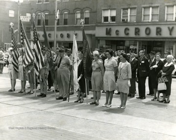 Men and women participating in the Memorial Observance in Morgantown at the Courthouse Square. 