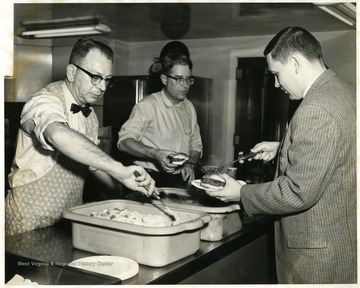 From left to right: Joe Ford and Leonard Gross, servers.