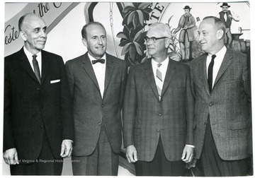 Second from the left is Dr. Ed Heiskell.
