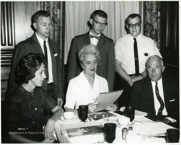 'Back row, left to right: Bill Wetzel, Art Hahn, Bill Leyke. Sitting, Left to right: unknown, Mrs. Esther Emerson, Robert Donley.'