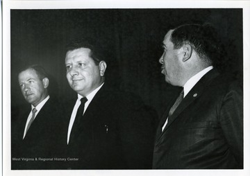 Donald Lazzelle is standing in between two unidentified gentlemen.